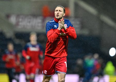 Photo for Luke Ayling of Middlesbrough claps fans as he warms up ahead of the match, during the Sky Bet Championship match Preston North End vs Middlesbrough at Deepdale, Preston, United Kingdom, 14th February 202 - Royalty Free Image