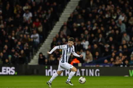 Photo for Mikey Johnston of West Bromwich Albion goes forward with the ball during the Sky Bet Championship match West Bromwich Albion vs Southampton at The Hawthorns, West Bromwich, United Kingdom, 16th February 202 - Royalty Free Image