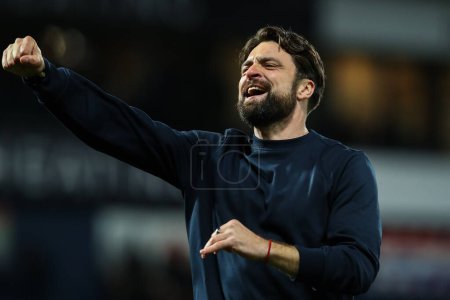 Photo for Russell Martin manager of Southampton celebrates his teams win after the Sky Bet Championship match West Bromwich Albion vs Southampton at The Hawthorns, West Bromwich, United Kingdom, 16th February 202 - Royalty Free Image