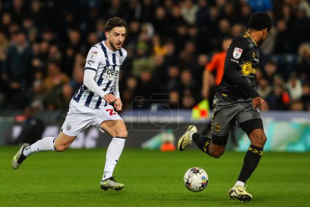 Photo for Samuel Edozie of Southampton goes forward with the ball during the Sky Bet Championship match West Bromwich Albion vs Southampton at The Hawthorns, West Bromwich, United Kingdom, 16th February 202 - Royalty Free Image