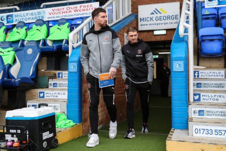 Photo for James Husband of Blackpool and George Byers of Blackpool arrive ahead of the Sky Bet League 1 match Peterborough United vs Blackpool at Weston Homes Stadium, Peterborough, United Kingdom, 17th February 202 - Royalty Free Image