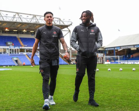 Photo for Jordan Lawrence-Gabriel of Blackpool and Kylian Kouassi of Blackpool arrive ahead of the Sky Bet League 1 match Peterborough United vs Blackpool at Weston Homes Stadium, Peterborough, United Kingdom, 17th February 202 - Royalty Free Image