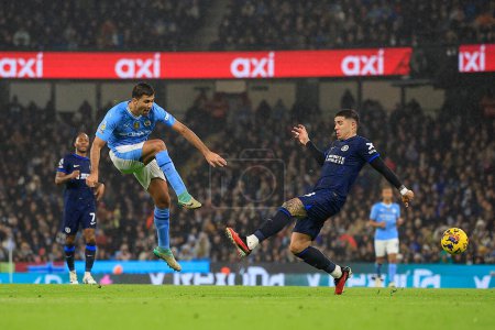 Photo for Rodrigo of Manchester City fires a shot on goal during the Premier League match Manchester City vs Chelsea at Etihad Stadium, Manchester, United Kingdom, 17th February 202 - Royalty Free Image