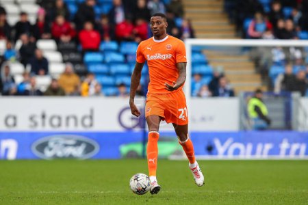 Photo for Marvin Ekpiteta of Blackpool goes forward with the ball during the Sky Bet League 1 match Peterborough United vs Blackpool at Weston Homes Stadium, Peterborough, United Kingdom, 17th February 202 - Royalty Free Image