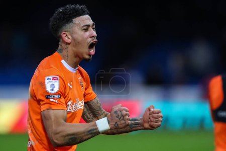 Photo for Jordan Lawrence-Gabriel of Blackpool celebrates his teams win after the Sky Bet League 1 match Peterborough United vs Blackpool at Weston Homes Stadium, Peterborough, United Kingdom, 17th February 202 - Royalty Free Image
