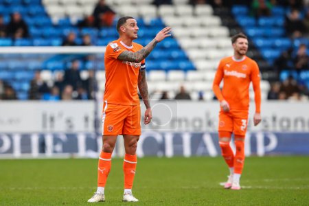 Photo for Oliver Norburn of Blackpool gives his teammates instructions during the Sky Bet League 1 match Peterborough United vs Blackpool at Weston Homes Stadium, Peterborough, United Kingdom, 17th February 202 - Royalty Free Image