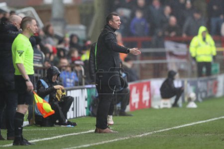 Photo for Neill Collins Head coach of Barnsley gives his team instructions during the Sky Bet League 1 match Fleetwood Town vs Barnsley at Highbury Stadium, Fleetwood, United Kingdom, 17th February 202 - Royalty Free Image
