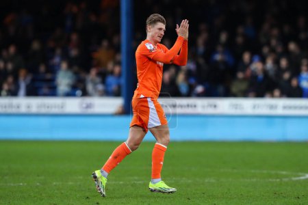 Photo for George Byers of Blackpool applauds the travelling fans as he is substituted off during the Sky Bet League 1 match Peterborough United vs Blackpool at Weston Homes Stadium, Peterborough, United Kingdom, 17th February 202 - Royalty Free Image