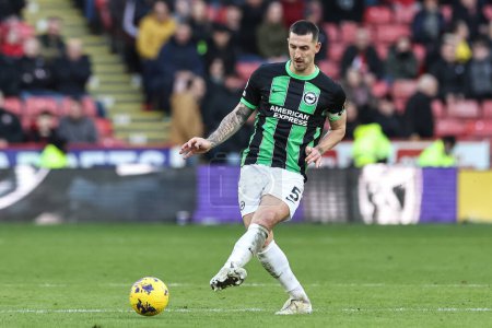 Photo for Lewis Dunk of Brighton & Hove Albion passes during the Premier League match Sheffield United vs Brighton and Hove Albion at Bramall Lane, Sheffield, United Kingdom, 18th February 202 - Royalty Free Image