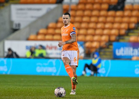 Photo for Oliver Norburn of Blackpool passes the ball, during the Bristol Street Motors Trophy Semi-Final match Blackpool vs Peterborough United at Bloomfield Road, Blackpool, United Kingdom, 20th February 202 - Royalty Free Image