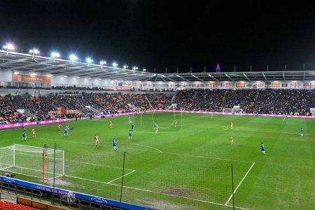 Photo for Blackpool fans watch on, during the Bristol Street Motors Trophy Semi-Final match Blackpool vs Peterborough United at Bloomfield Road, Blackpool, United Kingdom, 20th February 202 - Royalty Free Image