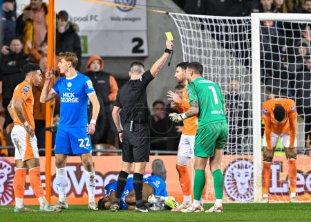 Photo for Richard O'Donnell of Blackpool gets a yellow card, during the Bristol Street Motors Trophy Semi-Final match Blackpool vs Peterborough United at Bloomfield Road, Blackpool, United Kingdom, 20th February 202 - Royalty Free Image