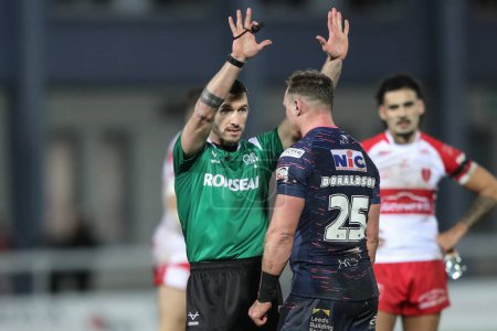 Photo for Referee Jack Smith speaks to James Donaldson of Leeds Rhinos during the Betfred Super League Round 2 match Hull KR vs Leeds Rhinos at Sewell Group Craven Park, Kingston upon Hull, United Kingdom, 22nd February 202 - Royalty Free Image