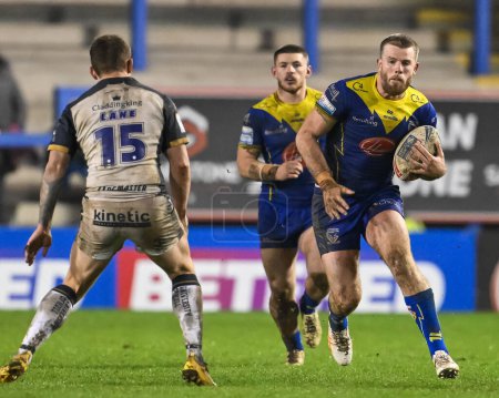 Photo for Lachlan Fitzgibbon of Warrington Wolves makes a break during the Betfred Super League Round 2 match Warrington Wolves vs Hull FC at Halliwell Jones Stadium, Warrington, United Kingdom, 23rd February 202 - Royalty Free Image