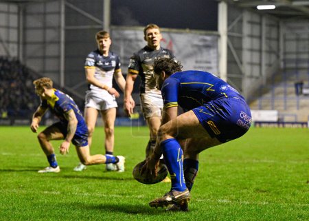 Photo for Toby King of Warrington Wolves scores a try to make it 26-10 Warrington, during the Betfred Super League Round 2 match Warrington Wolves vs Hull FC at Halliwell Jones Stadium, Warrington, United Kingdom, 23rd February 202 - Royalty Free Image