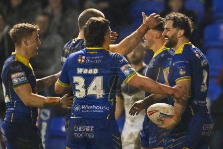 Photo for Toby King of Warrington Wolves celebrates his try during the Betfred Super League Round 2 match Warrington Wolves vs Hull FC at Halliwell Jones Stadium, Warrington, United Kingdom, 23rd February 202 - Royalty Free Image