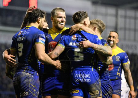 Photo for Toby King of Warrington Wolves celebrates his try to make it 26-10 Warrington, during the Betfred Super League Round 2 match Warrington Wolves vs Hull FC at Halliwell Jones Stadium, Warrington, United Kingdom, 23rd February 202 - Royalty Free Image