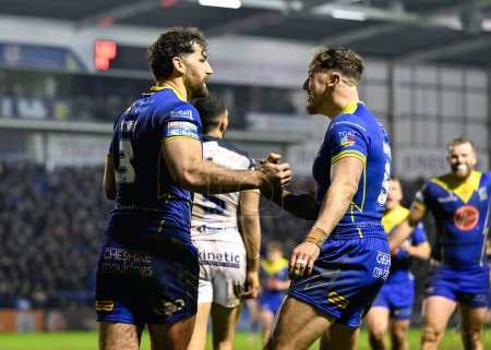 Photo for Toby King of Warrington Wolves celebrates his try to make it 26-10 Warrington, during the Betfred Super League Round 2 match Warrington Wolves vs Hull FC at Halliwell Jones Stadium, Warrington, United Kingdom, 23rd February 202 - Royalty Free Image