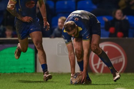 Photo for James Harrison of Warrington Wolves goes over for a tryduring the Betfred Super League Round 2 match Warrington Wolves vs Hull FC at Halliwell Jones Stadium, Warrington, United Kingdom, 23rd February 202 - Royalty Free Image
