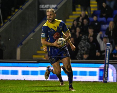 Photo for Lachlan Fitzgibbon of Warrington Wolves runs for a try to make it 30-10 Warrington, during the Betfred Super League Round 2 match Warrington Wolves vs Hull FC at Halliwell Jones Stadium, Warrington, United Kingdom, 23rd February 202 - Royalty Free Image