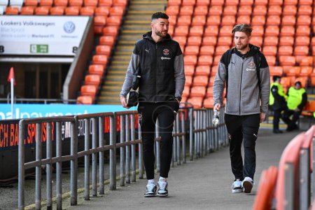 Photo for Richard O'Donnell of Blackpool and Hayden Coulson of Blackpool arrive ahead of the Sky Bet League 1 match Blackpool vs Bolton Wanderers at Bloomfield Road, Blackpool, United Kingdom, 24th February 202 - Royalty Free Image
