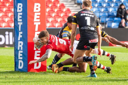 Photo for Amir Bourouh of Salford Red Devils goes over for a try during the Betfred Super League match Salford Red Devils vs Castleford Tigers at Salford Community Stadium, Eccles, United Kingdom, 25th February 202 - Royalty Free Image