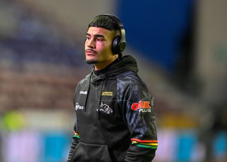 Photo for Taylan May of Penrith Panthers inspects the pitch ahead of the match, during the 2024 World Club Challenge match Wigan Warriors vs Penrith Panthers at DW Stadium, Wigan, United Kingdom, 24th February 202 - Royalty Free Image