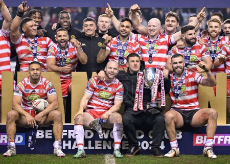 Photo for Wigan Warriors celebrates their World Club Challenge win, during the 2024 World Club Challenge match Wigan Warriors vs Penrith Panthers at DW Stadium, Wigan, United Kingdom, 24th February 202 - Royalty Free Image