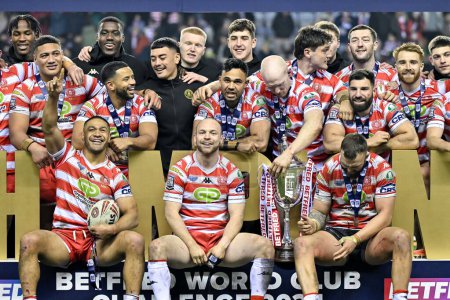Photo for Wigan Warriors all smiles with the World Club Challenge trophy, during the 2024 World Club Challenge match Wigan Warriors vs Penrith Panthers at DW Stadium, Wigan, United Kingdom, 24th February 202 - Royalty Free Image