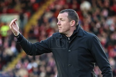 Photo for Neill Collins Head coach of Barnsley reacts during the Sky Bet League 1 match Barnsley vs Derby County at Oakwell, Barnsley, United Kingdom, 24th February 202 - Royalty Free Image