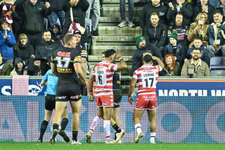 Photo for Kruise Leeming of Wigan Warriors celebrates his try to make it 8-4 Wigan, during the 2024 World Club Challenge match Wigan Warriors vs Penrith Panthers at DW Stadium, Wigan, United Kingdom, 24th February 202 - Royalty Free Image