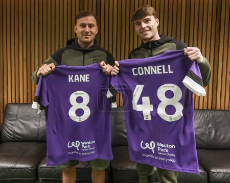 Photo for Herbie Kane of Barnsley and Luca Connell of Barnsley with their Weston Park takeover day training shirts during the Sky Bet League 1 match Barnsley vs Derby County at Oakwell, Barnsley, United Kingdom, 24th February 202 - Royalty Free Image
