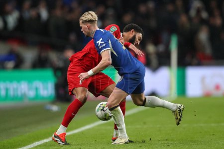 Photo for L2in action nd Mykhaylo Mudryk of Chelsea battle for the ball during the Carabao Cup Final match Chelsea vs Liverpool at Wembley Stadium, London, United Kingdom, 25th February 202 - Royalty Free Image