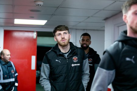 Photo for Matthew Pennington of Blackpool arrives at the stadium prior to the Sky Bet League 1 match Leyton Orient vs Blackpool at Matchroom Stadium, London, United Kingdom, 27th February 202 - Royalty Free Image