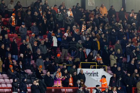 Photo for A general view of the supporters of Blackpool is seen during the Sky Bet League 1 match Leyton Orient vs Blackpool at Matchroom Stadium, London, United Kingdom, 27th February 202 - Royalty Free Image