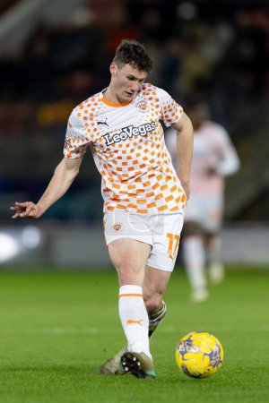 Photo for Matty Virtue of Blackpool passes the ball during the Sky Bet League 1 match Leyton Orient vs Blackpool at Matchroom Stadium, London, United Kingdom, 27th February 202 - Royalty Free Image