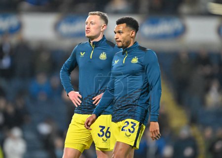 Photo for Sean Longstaff of Newcastle United and Jacob Murphy of Newcastle United warm up ahead of the match, during the Emirates FA Cup 5th Round match Blackburn Rovers vs Newcastle United at Ewood Park, Blackburn, United Kingdom, 27th February 202 - Royalty Free Image