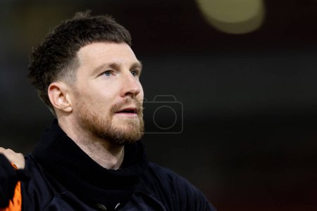 Photo for Oliver Casey of Blackpool warming up prior to the Sky Bet League 1 match Leyton Orient vs Blackpool at Matchroom Stadium, London, United Kingdom, 27th February 202 - Royalty Free Image