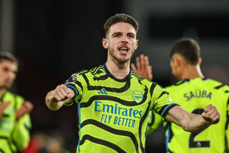 Photo for Declan Rice of Arsenal celebrates his side victory in the Premier League match Sheffield United vs Arsenal at Bramall Lane, Sheffield, United Kingdom, 4th March 202 - Royalty Free Image