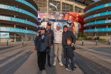 Photo for Fans arrive at the Etihad during the UEFA Champions League match Manchester City vs F.C. Copenhagen at Etihad Stadium, Manchester, United Kingdom, 6th March 202 - Royalty Free Image