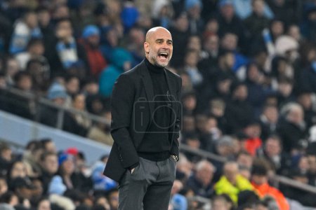 Photo for Pep Guardiola manager of Manchester City gives his team instructions during the UEFA Champions League match Manchester City vs F.C. Copenhagen at Etihad Stadium, Manchester, United Kingdom, 6th March 202 - Royalty Free Image