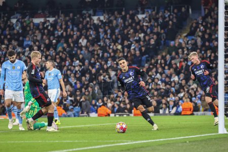 Photo for Mohamed Elyounoussi of FC Copenhagen scores and celebrates his goal to make it 2-1 during the UEFA Champions League match Manchester City vs F.C. Copenhagen at Etihad Stadium, Manchester, United Kingdom, 6th March 202 - Royalty Free Image