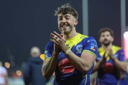 Photo for Matty Ashton of Warrington Wolves applauds the travelling fans after winning the game during the Betfred Super League Round 4 match Hull KR vs Warrington Wolves at Sewell Group Craven Park, Kingston upon Hull, United Kingdom, 7th March 202 - Royalty Free Image