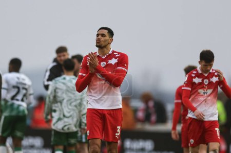 Photo for Jon Russell of Barnsley applauds the home fans after losing 1-5 during the Sky Bet League 1 match Barnsley vs Lincoln City at Oakwell, Barnsley, United Kingdom, 9th March 202 - Royalty Free Image