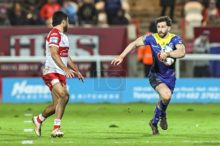 Photo for Toby King of Warrington Wolves makes a break during the Betfred Super League Round 4 match Hull KR vs Warrington Wolves at Sewell Group Craven Park, Kingston upon Hull, United Kingdom, 7th March 202 - Royalty Free Image