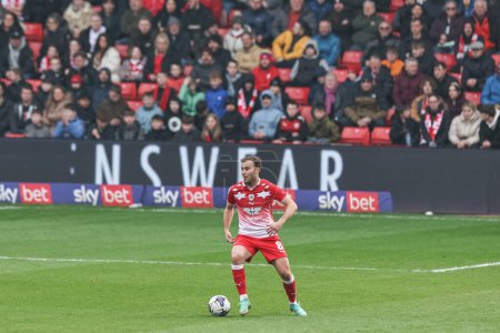 Photo for Herbie Kane of Barnsley with the ball during the Sky Bet League 1 match Barnsley vs Lincoln City at Oakwell, Barnsley, United Kingdom, 9th March 202 - Royalty Free Image