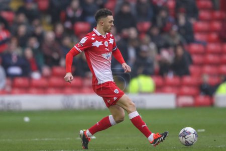 Photo for Jordan Williams of Barnsley passes the ball during the Sky Bet League 1 match Barnsley vs Lincoln City at Oakwell, Barnsley, United Kingdom, 9th March 202 - Royalty Free Image