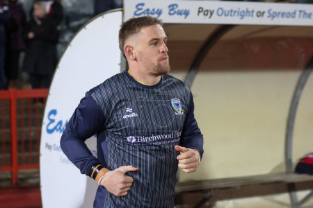 Photo for Matt Dufty of Warrington Wolves comes out for the pregame warmups during the Betfred Super League Round 4 match Hull KR vs Warrington Wolves at Sewell Group Craven Park, Kingston upon Hull, United Kingdom, 7th March 202 - Royalty Free Image