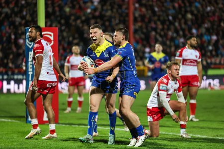 Photo for George Williams of Warrington Wolves celebrates his try during the Betfred Super League Round 4 match Hull KR vs Warrington Wolves at Sewell Group Craven Park, Kingston upon Hull, United Kingdom, 7th March 202 - Royalty Free Image