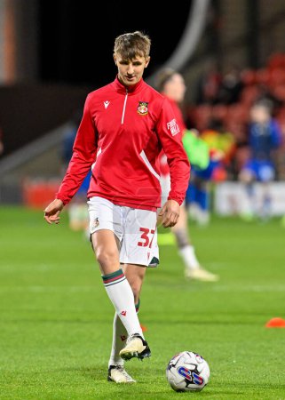 Photo for Max Cleworth of Wrexham warms up ahead of the match, during the Sky Bet League 2 match Wrexham vs Harrogate Town at SToK Cae Ras, Wrexham, United Kingdom, 12th March 202 - Royalty Free Image